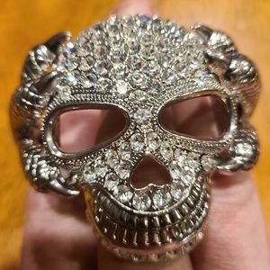 Skull And Talons Clamp style bracelet. Rhinestones.
